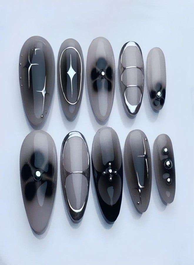 KRTBKR 24Pcs Black Press on Nails Medium Almond Fake Nails Black Flower with Silver Star Full Cover Glue on Nails Reusable Acrylic Star False Nails Glossy Stick on Nails for Women Girls Manicure Salon Kits - Image 1